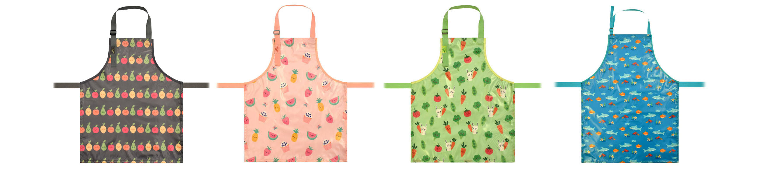 Four Bibetta Wipeezee wipe clean aprons in a row in grey fruit, pink yummy treats, green bunny and veg and turquoise sea creatures patterns. The aprons are laid flat on a white background. Aprons for children and adults