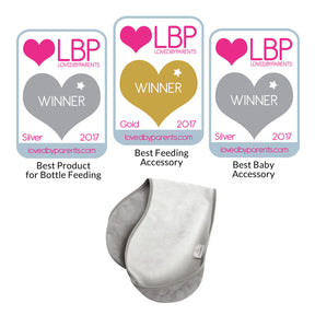 bibetta burp cloth in white and grey folded in half on a white background with three awards from LBP in 2017. Silver for Best Product for Bottle Feeding, Gold for Best Feeding Accessory, Silver for Best Baby Accessory