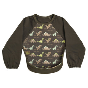 Bibetta grey baby bib with sleeves with dinosaurs pattern, made of neoprene material, featuring different dinosaurs in a design with the pocket flipped out to the front