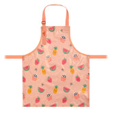 a bibetta wipeezee childs apron in pink yummy treats pattern laid flat . It has pink neck strap and waist straps.