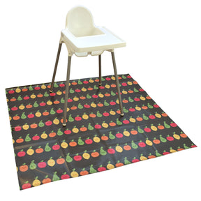 Bibetta wipeezee splash mat in grey happy fruit pattern laid on the floor with a white ikea highchair on it.