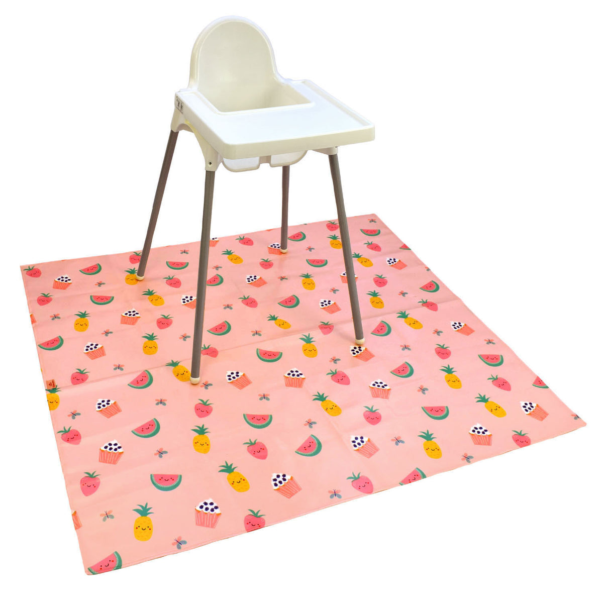 Bibetta wipeezee splash mat in pink yummy treats pattern laid on the floor with a white ikea highchair on it.