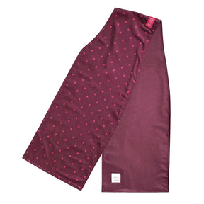 burgundy straight scarf clothing protector with small white polka dots on a white background, showing the top and bottom material.