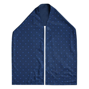 Navy blue straight scarf clothing protector with small white polka dots on a white background