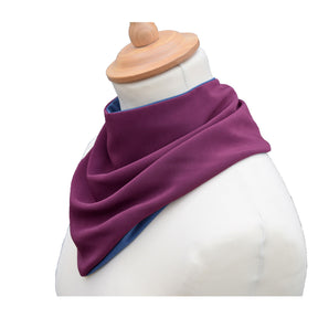 Side view of an aubergine neckerchief bib on a mannequin with a white background