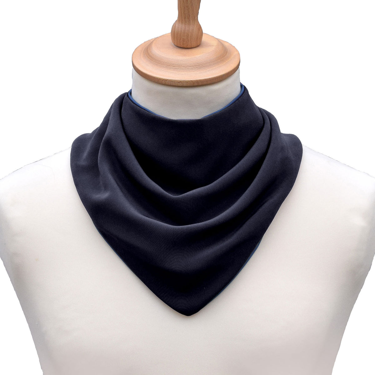 Black neckerchief bib on a mannequin with a white background