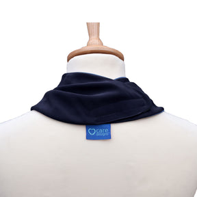Back view of a black neckerchief bib on a mannequin with 'care designs' label.