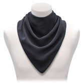 Long black neckerchief bib on a mannequin bust against a white background