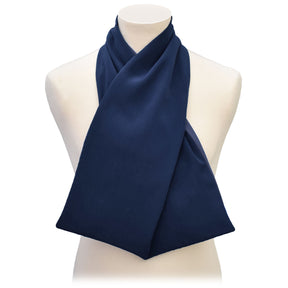 Navy blue cross scarf clothing protector on a mannequin against a white background